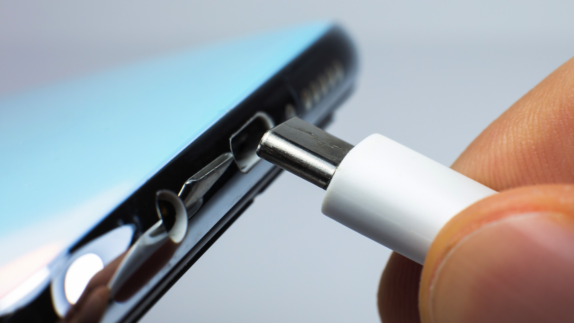 How to clean USB C port on phone